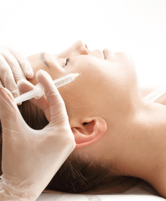 Womn receiving mesotherapy treatment