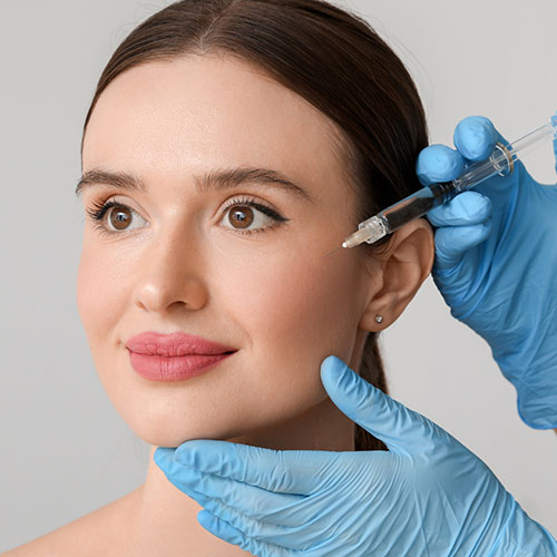 Beautiful woman smiling while having her treatment